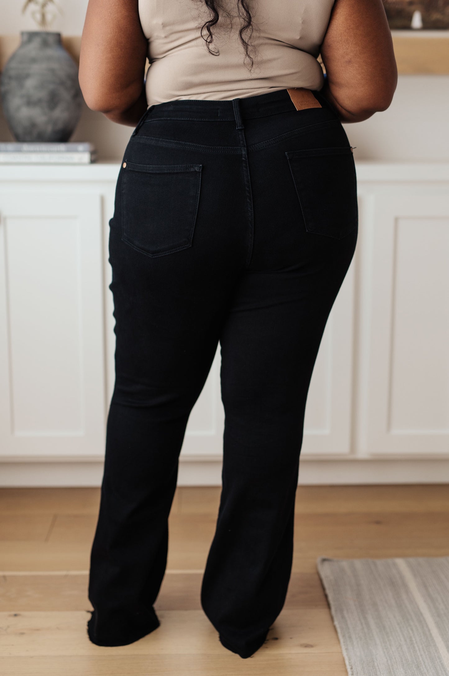 Etta High Rise Tummy Control Flare Jeans in Black