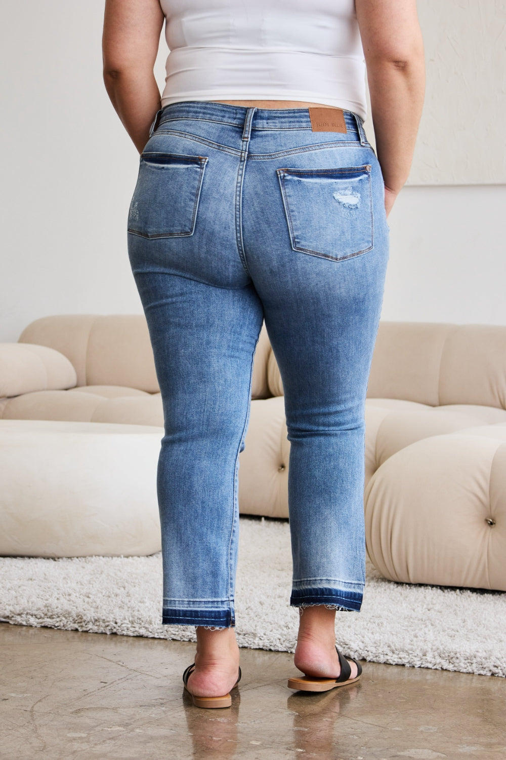 Avery Mid Rise Raw Hem Cropped Bootcut Jeans