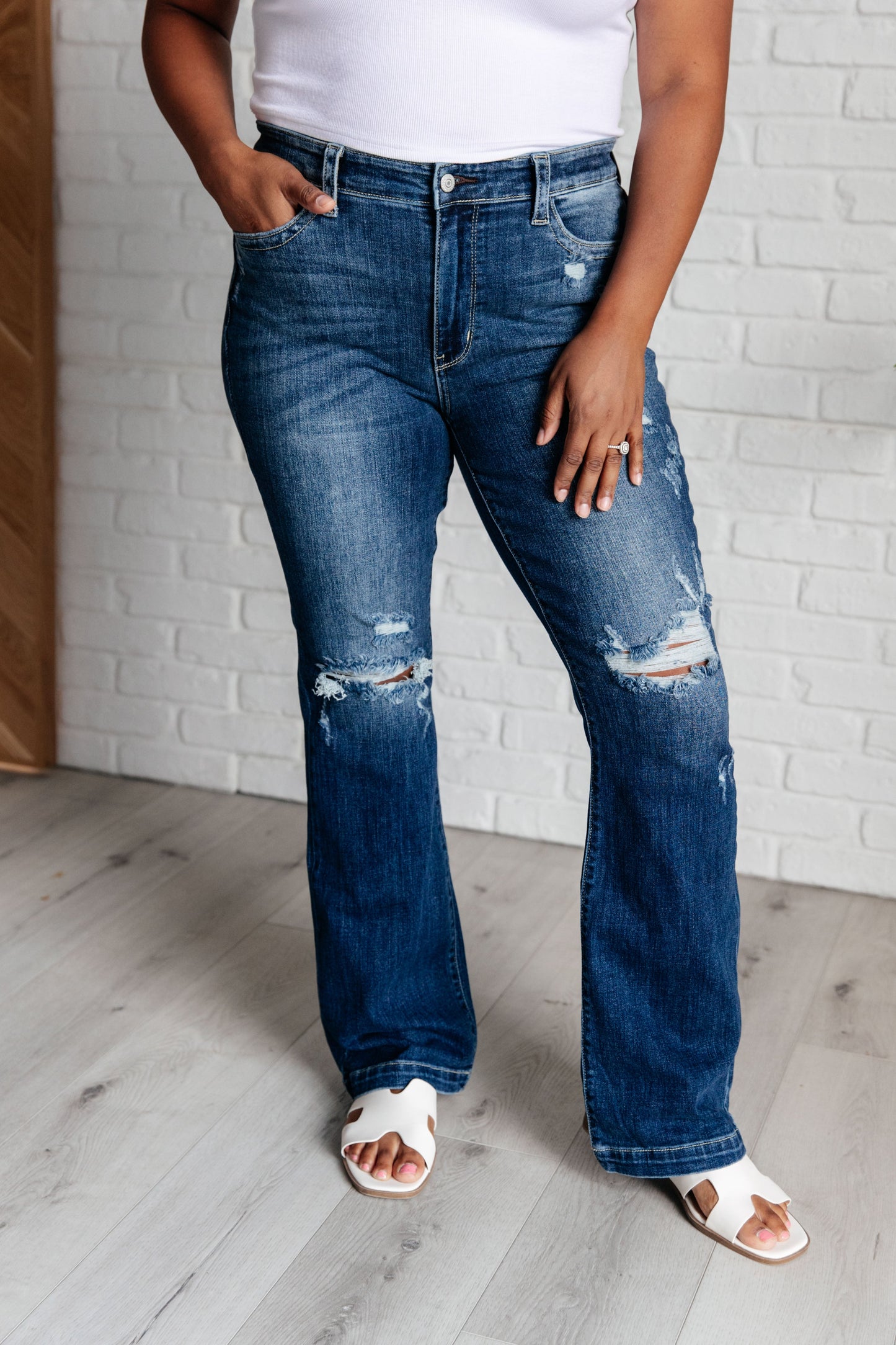 Avery Mid Rise Distressed Bootcut Jeans