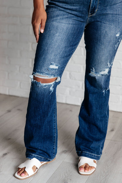 Avery Mid Rise Distressed Bootcut Jeans