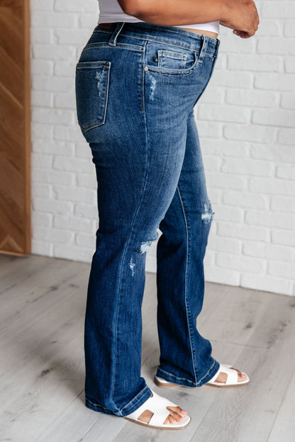 Avery Mid Rise Distressed Bootcut Jeans