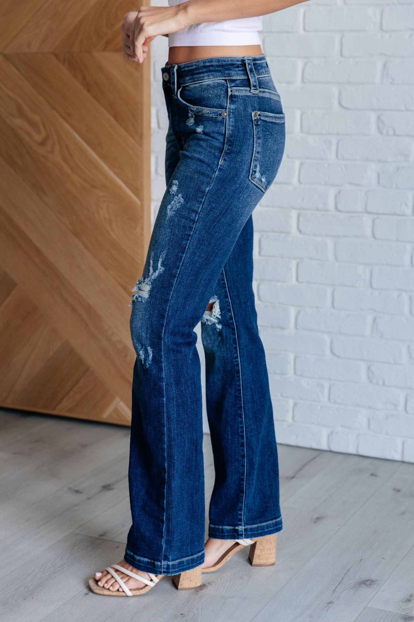 Avery Mid Rise Distressed Bootcut Jeans