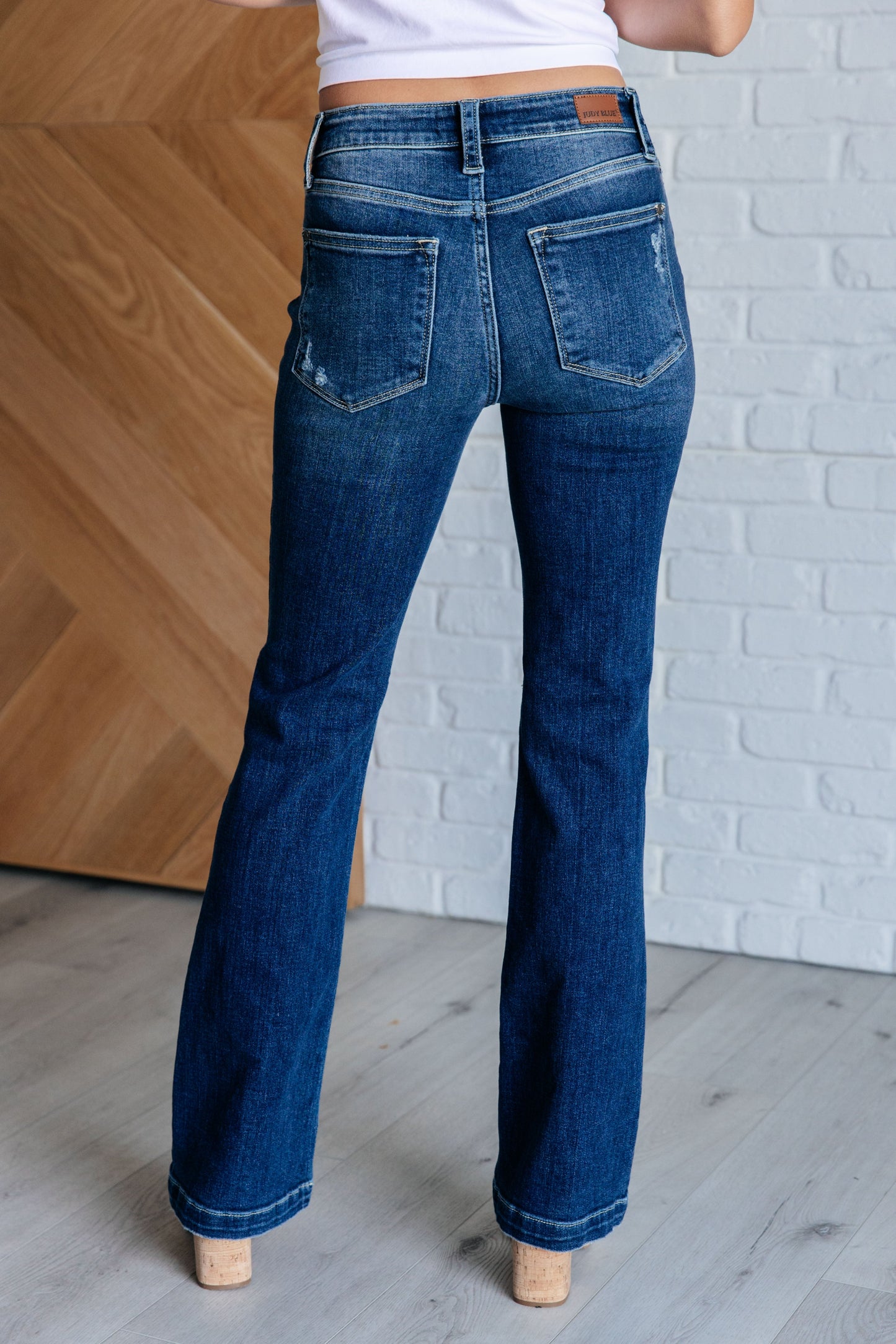 Avery Mid Rise Distressed Bootcut Jeans