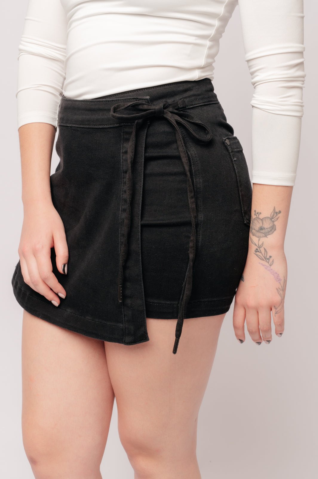 Bentli High Rise Side Tie Denim Skort in Black - Driftwood Boutique