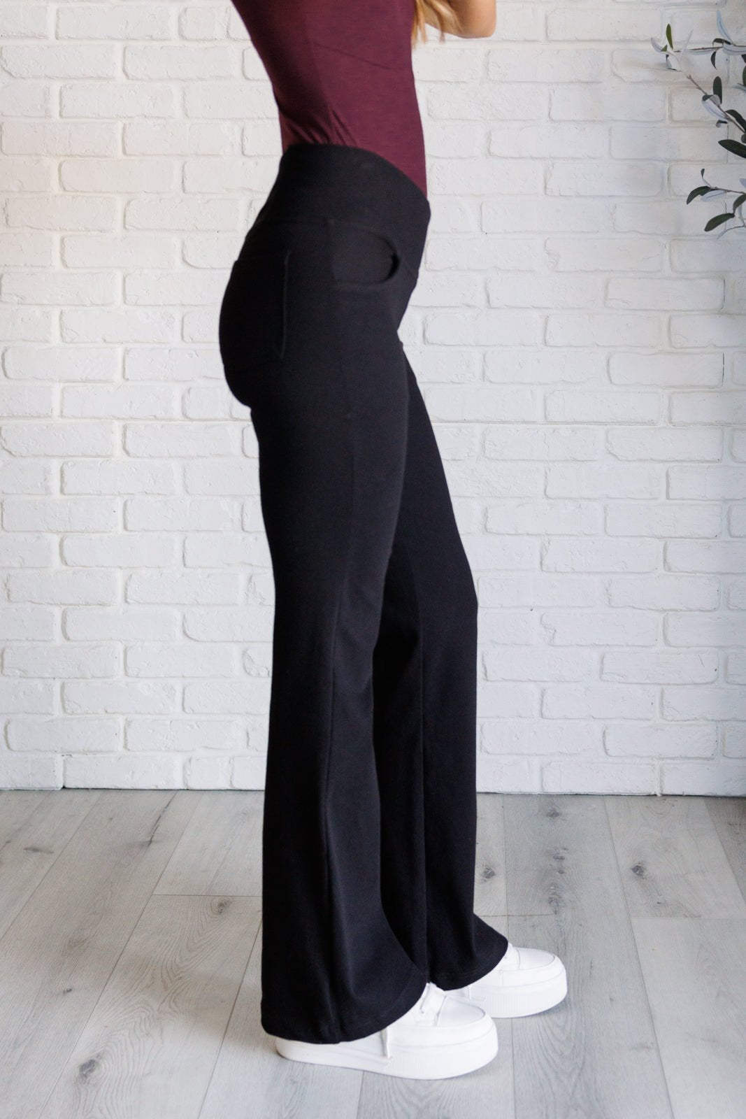 Building Habits Twill Flared Crossover Waist Pant in Black - Driftwood Boutique