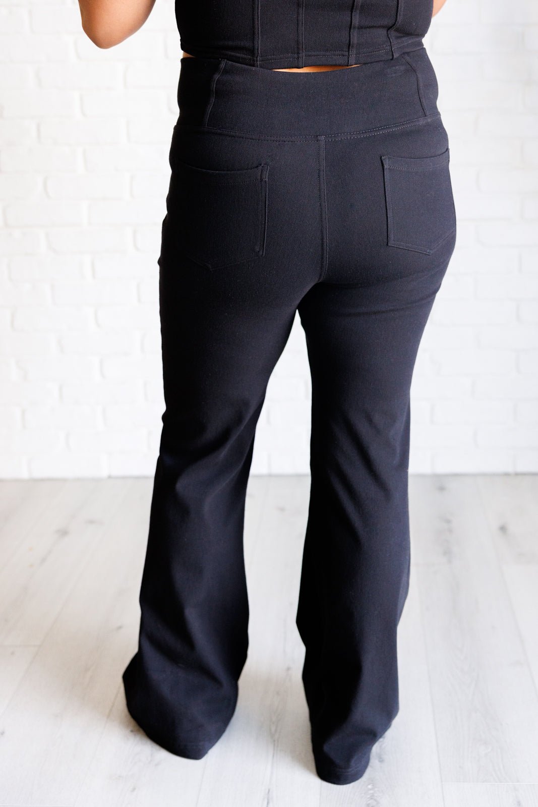 Building Habits Twill Flared Crossover Waist Pant in Black - Driftwood Boutique