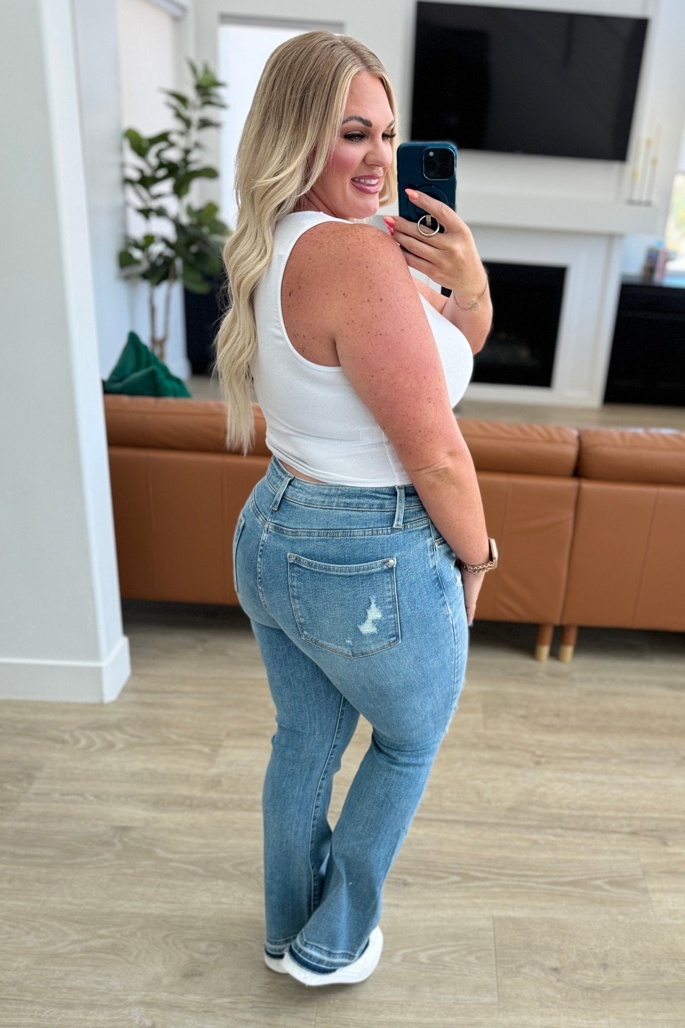 Isla Mid Rise Distressed Released Hem Bootcut Jeans - Driftwood Boutique
