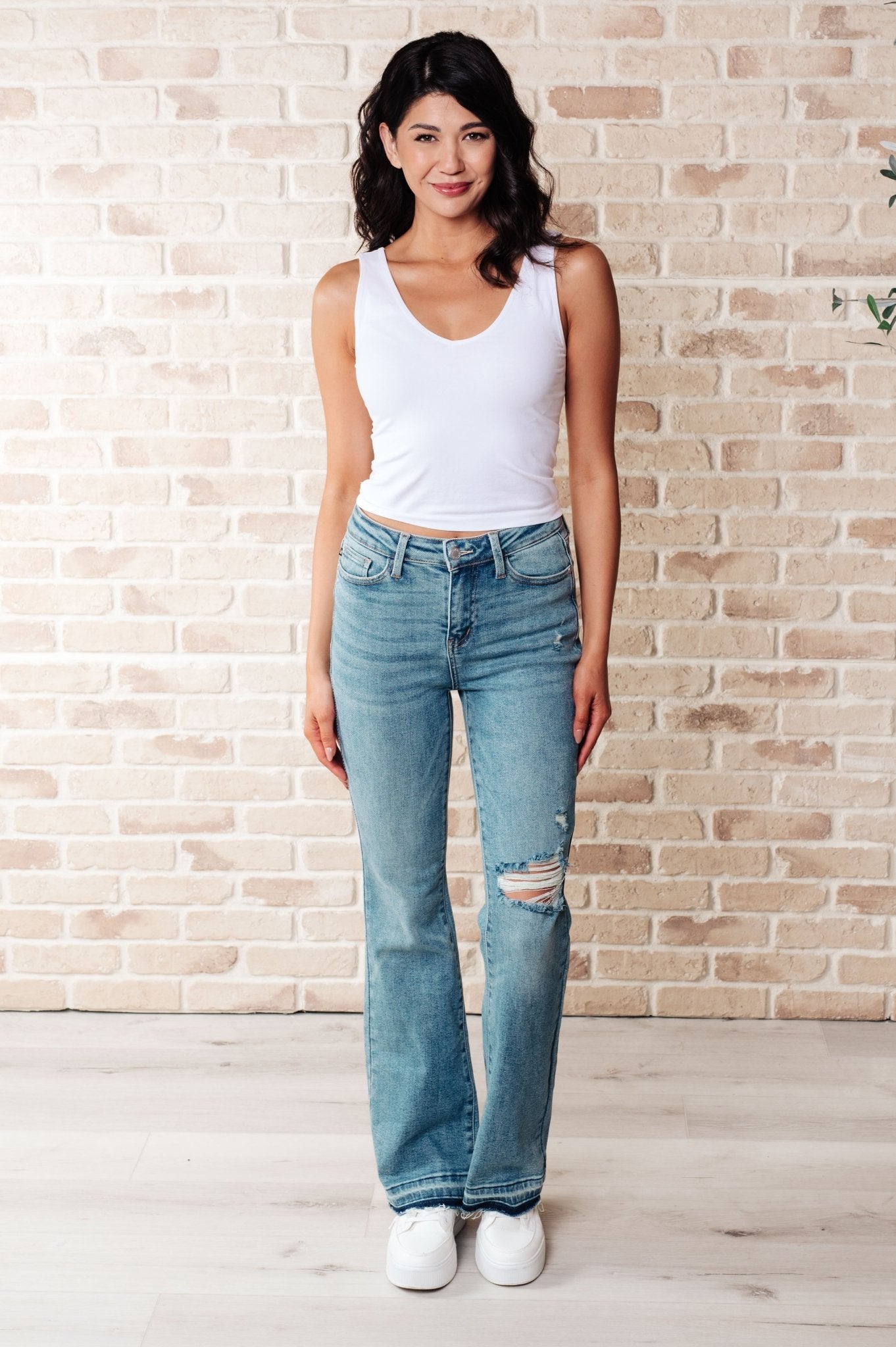 Isla Mid Rise Distressed Released Hem Bootcut Jeans - Driftwood Boutique