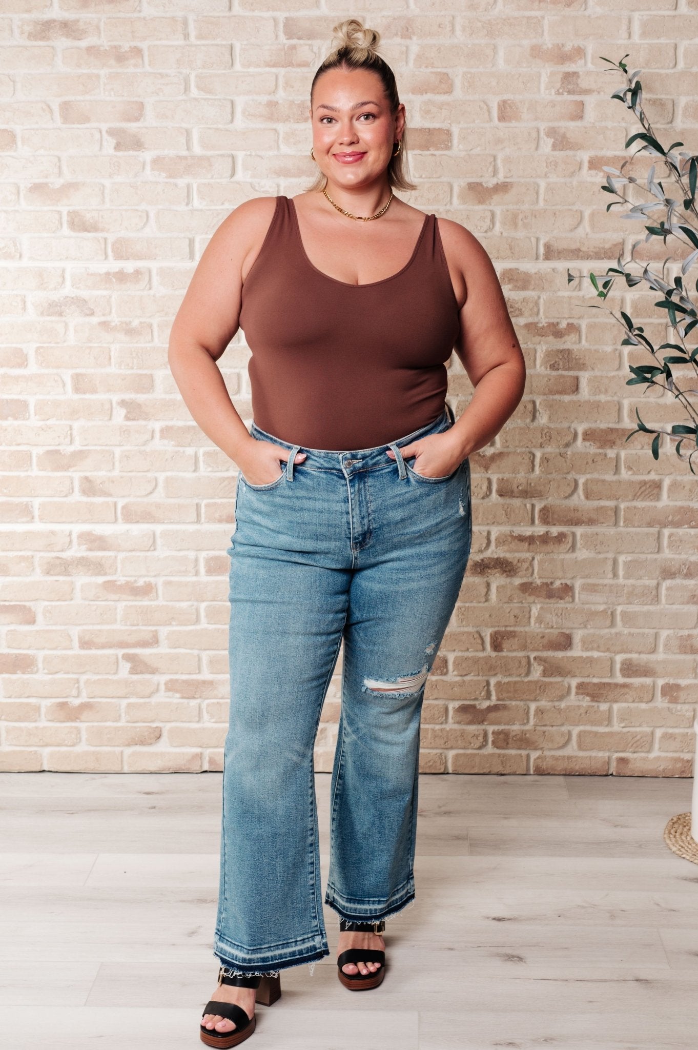 Isla Mid Rise Distressed Released Hem Bootcut Jeans - Driftwood Boutique