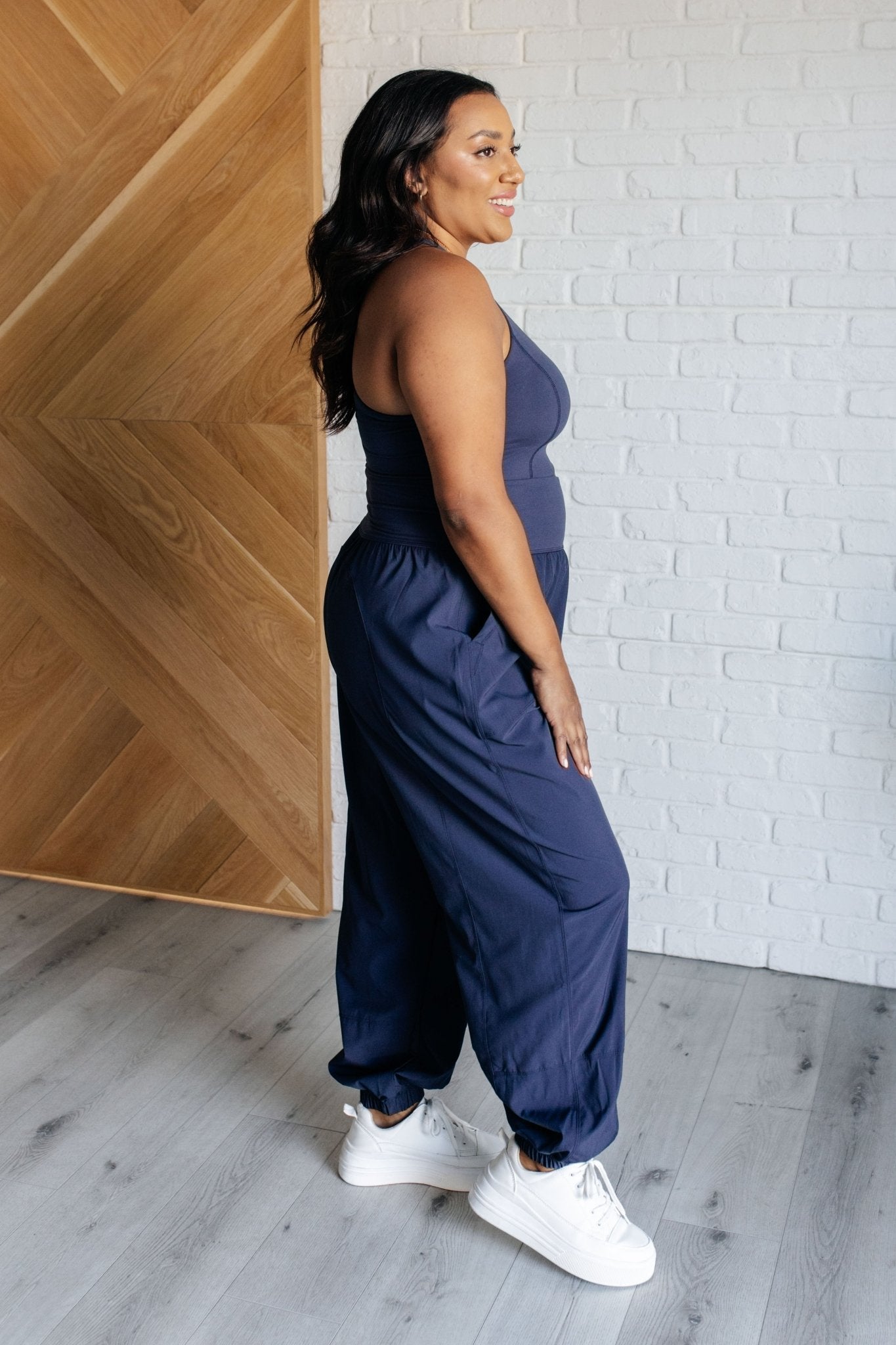 Raising Heart Rate Cut Out Jumpsuit in Navy - Driftwood Boutique