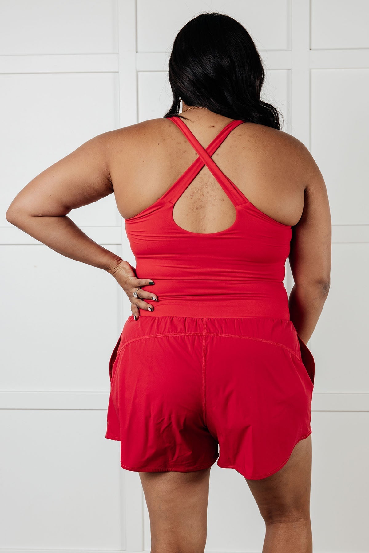 Raising Heart Rate Cutout Runsie In True Red - Driftwood Boutique
