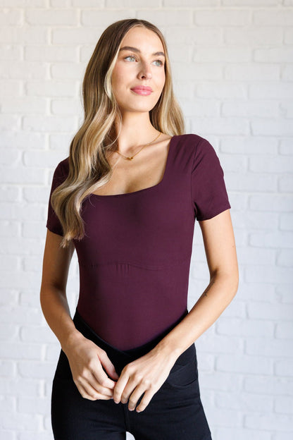 They're Not Like Us Square Neck Bodysuit in Cassis - Driftwood Boutique